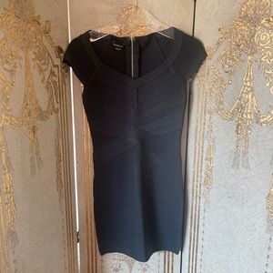 BEBE bodycon dress in size Small. Green/black.